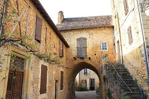 Stone arch in centre of Cadouin