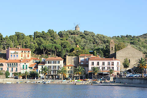 Castle and church belltower above the bay