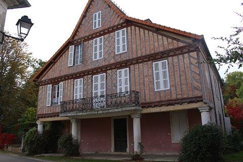 Colombage houses with stone columns in Mauvezin d'Armagnac