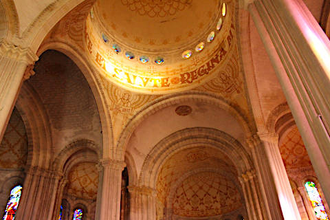 the nave and dome inside the basilica Notre-Dame in Penne d'Agenais