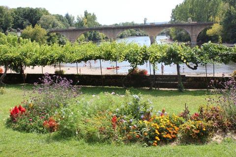 view of river and public gardens in Limeuil