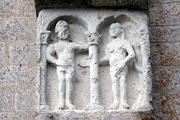 medieval stone carving on church wall in Montcaret