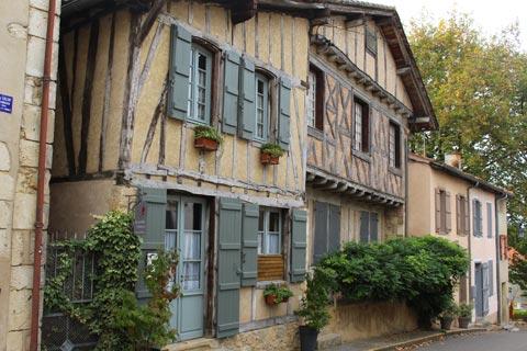 Colombage houses quiet street in Labastide d'Armagnac